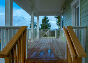 Elegant back patio designs with a stairway